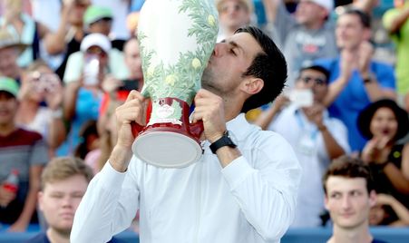 Djokovic stands alone with big titles sweep