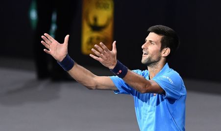 Djokovic catches confetti