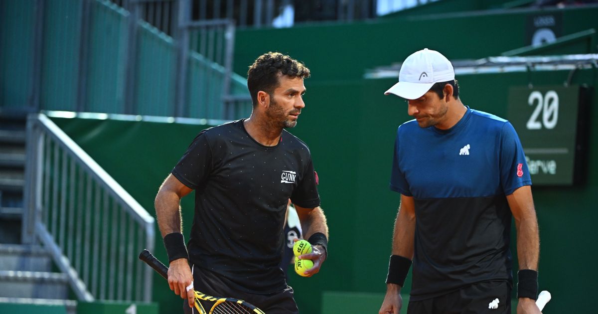 W. Blumberg & S. Johnson vs M. Arevalo & J. Rojer