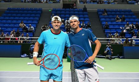 Holger Rune and Daniel Altmaier stand together with rackets at the 2026 Shanghai Masters.